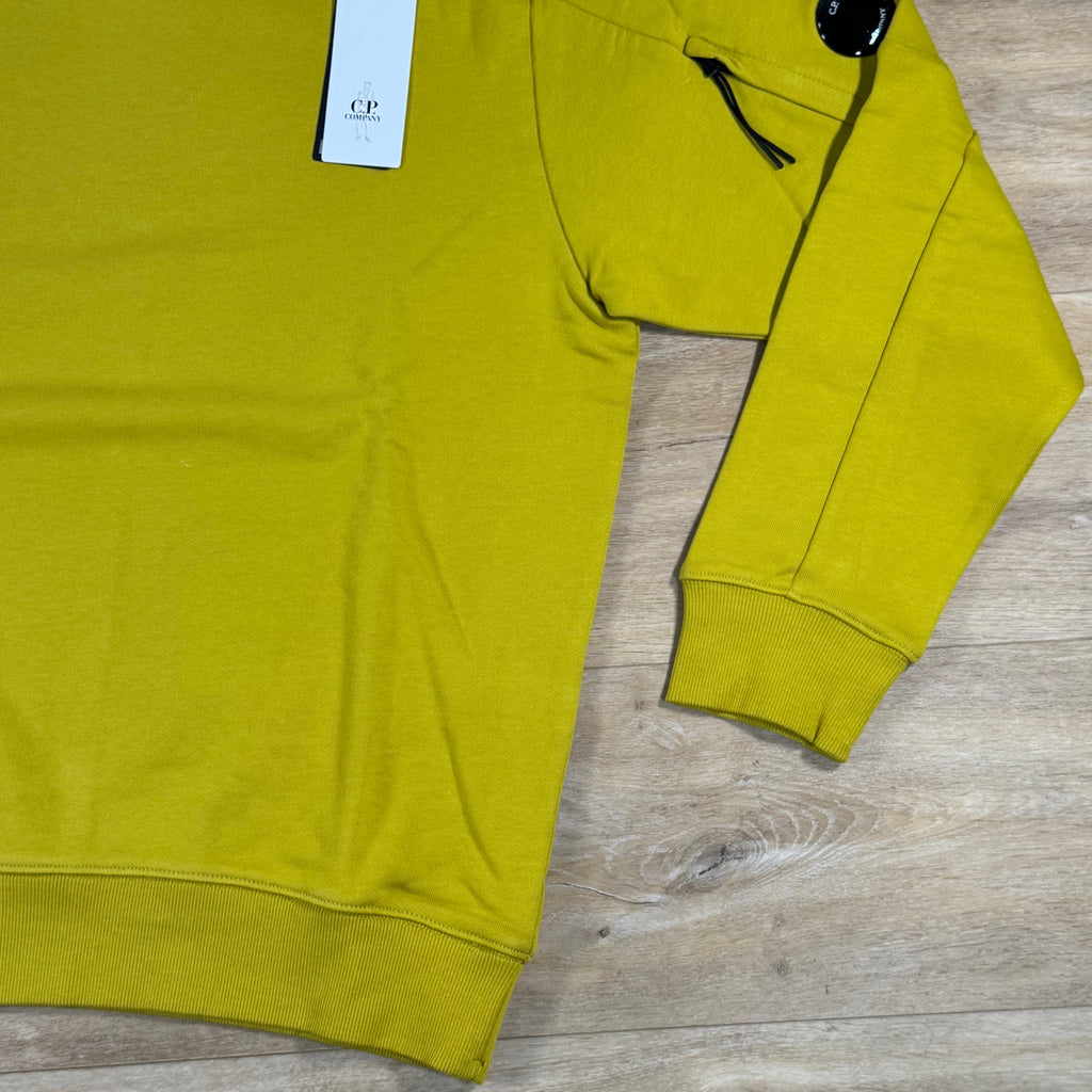 C.P. Company Diagonal Raised Fleece Crewneck Lens Sweatshirt in Antique Moss - Yellow