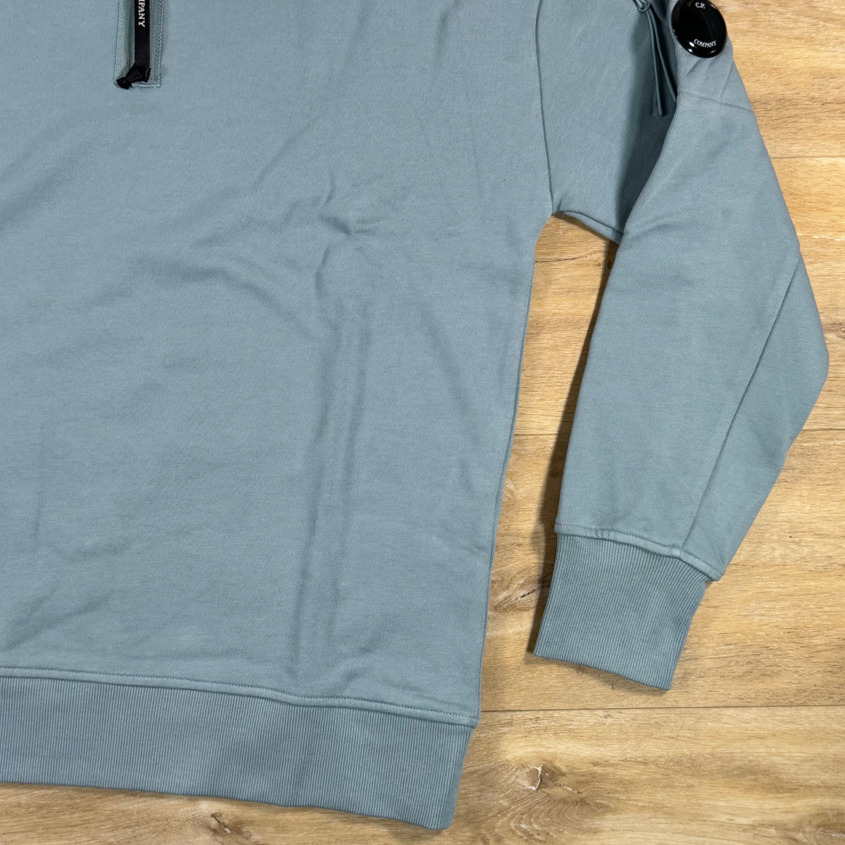 C.P. Company Diagonal Raised Half-Zip Lens Sweatshirt in Silver Blue