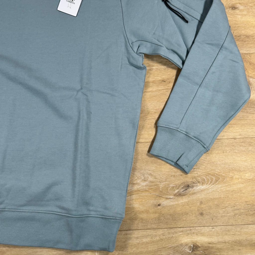 C.P. Company Diagonal Raised Fleece Crewneck Lens Sweatshirt in Silver Blue