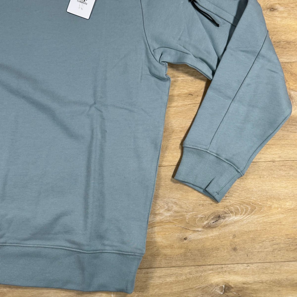 C.P. Company Diagonal Raised Fleece Crewneck Lens Sweatshirt in Silver Blue