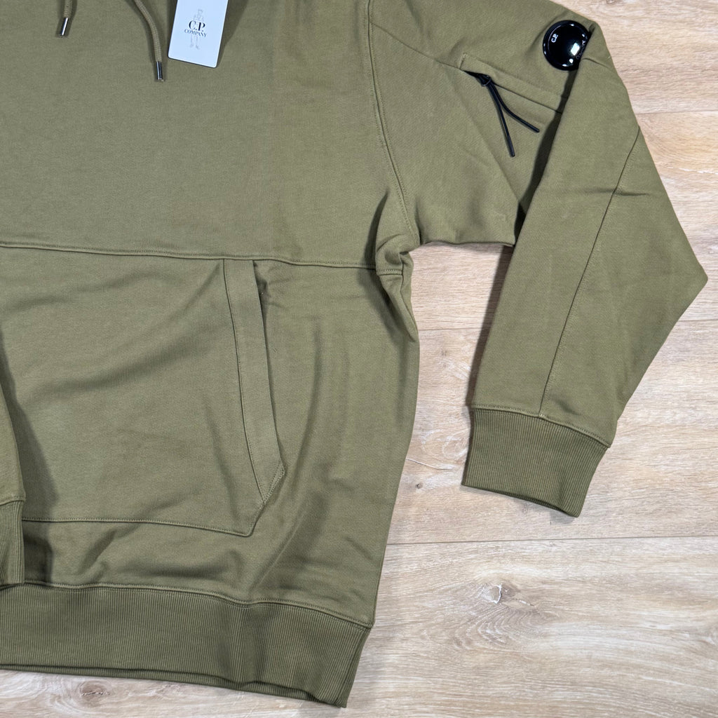 C.P. Company Diagonal Raised Fleece Lens Hoodie in Dried Herb - Green