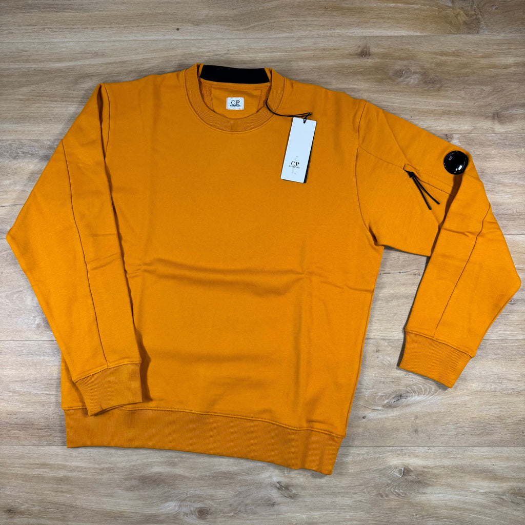 C.P. Company Diagonal Raised Fleece Crewneck Lens Sweatshirt in Desert Sun