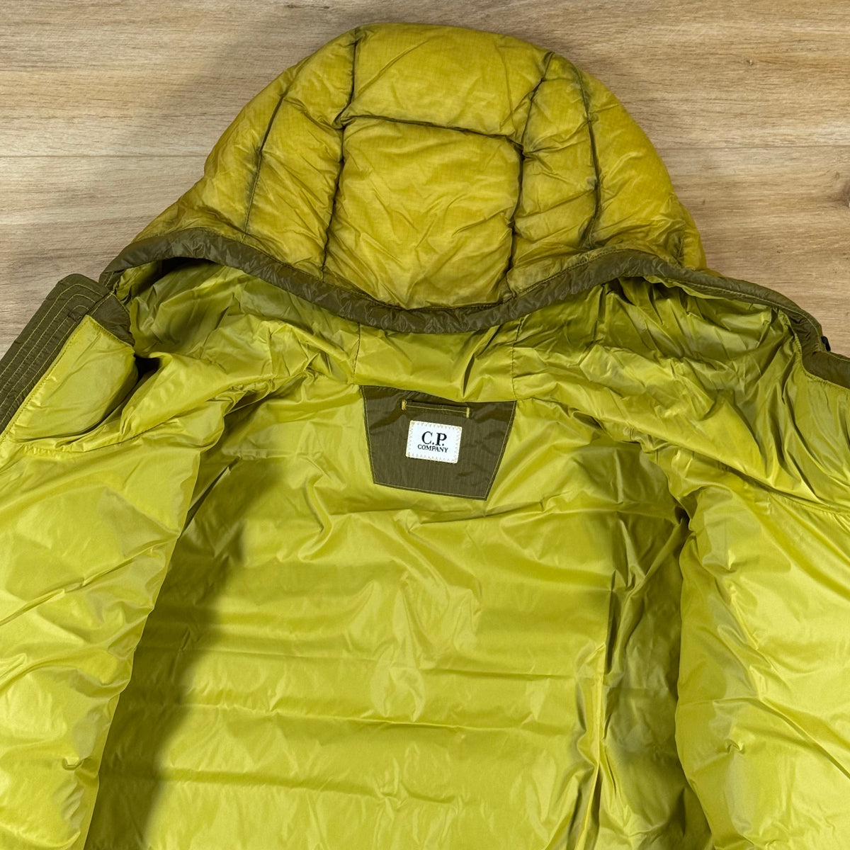 C.P. Company D.D. Shell Lens Down Jacket in Antique Moss - Yellow