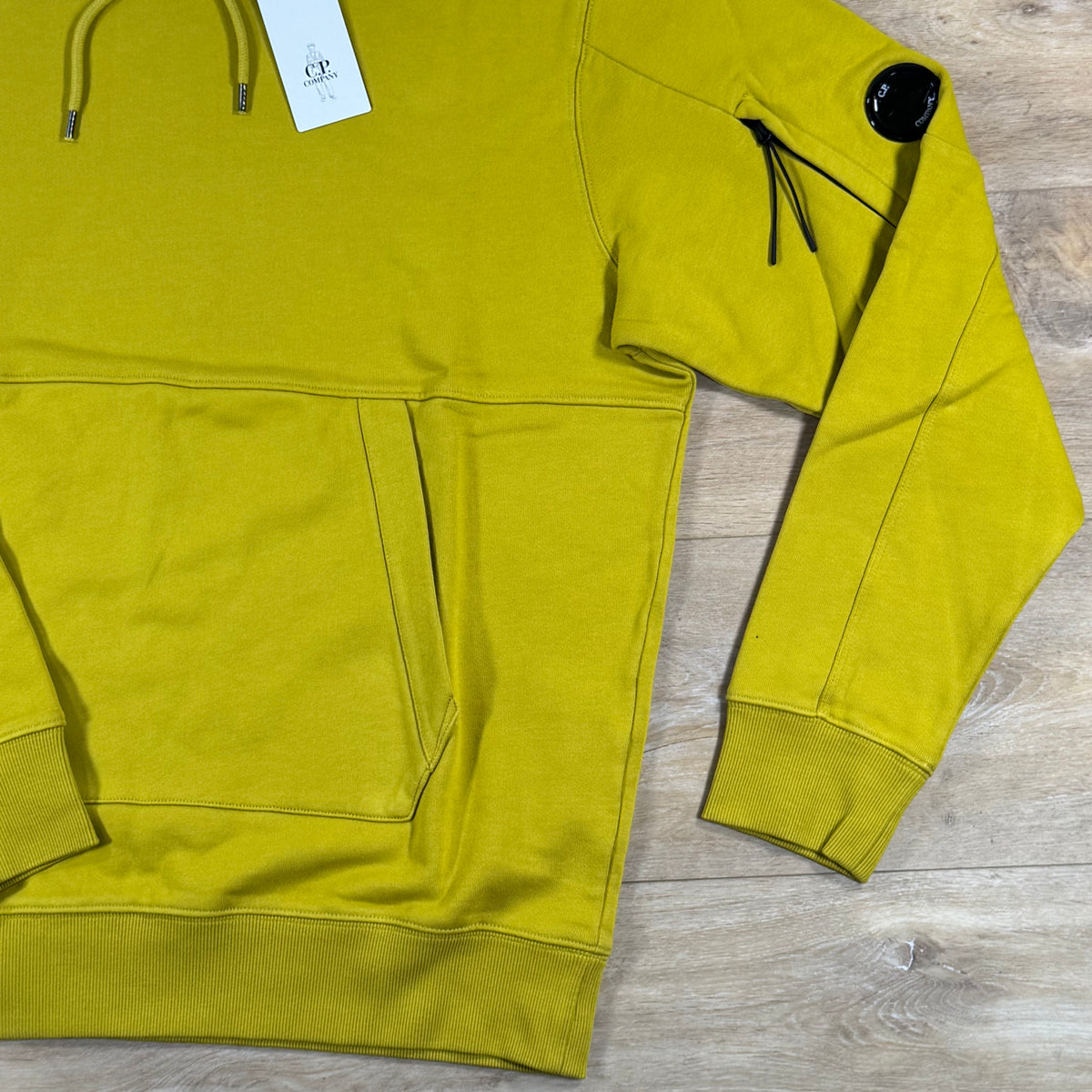 C.P. Company Diagonal Raised Fleece Lens Hoodie in Antique Moss - Yellow