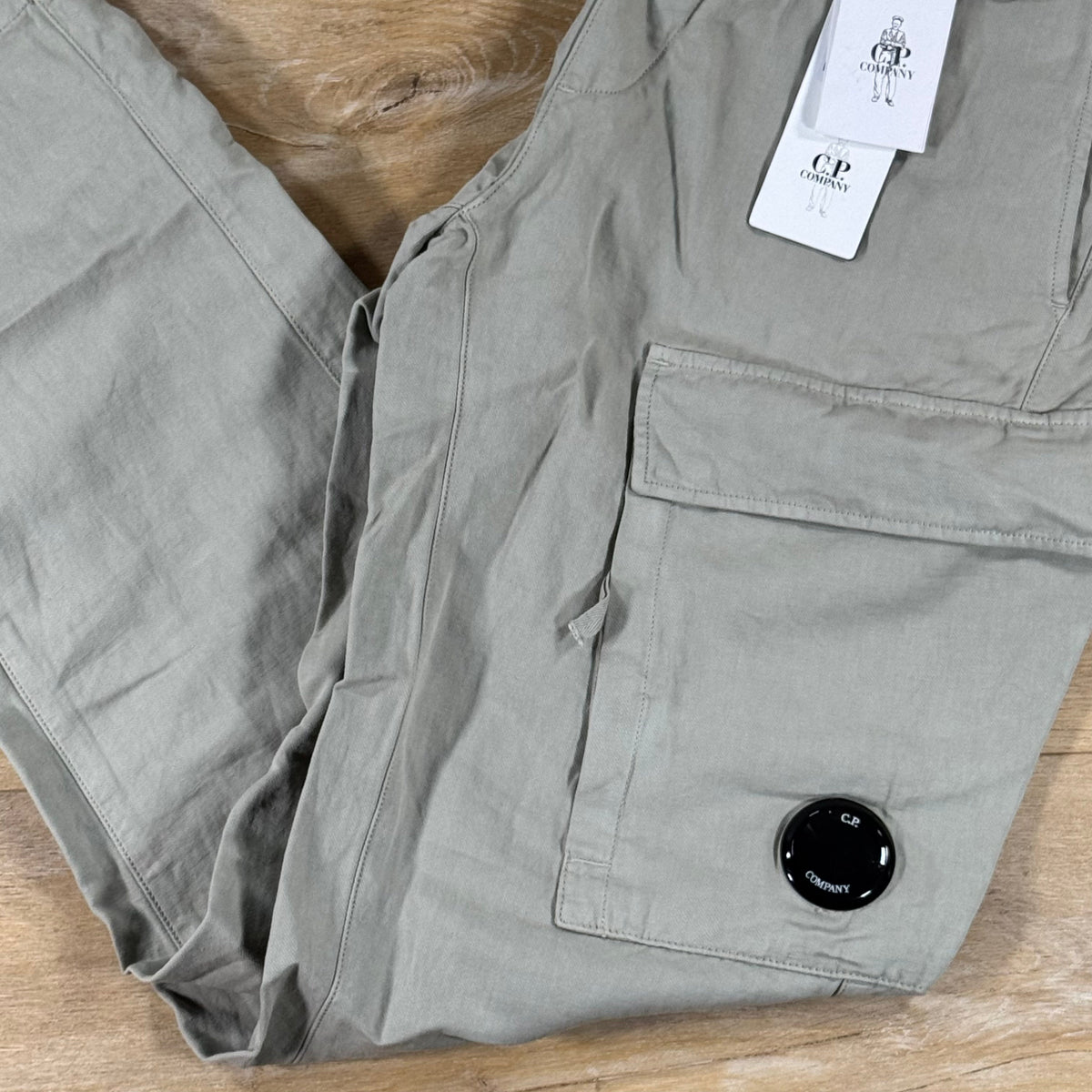 C.P. Company Cotton Linen Elasticated Lens Cargo Pants in Dove