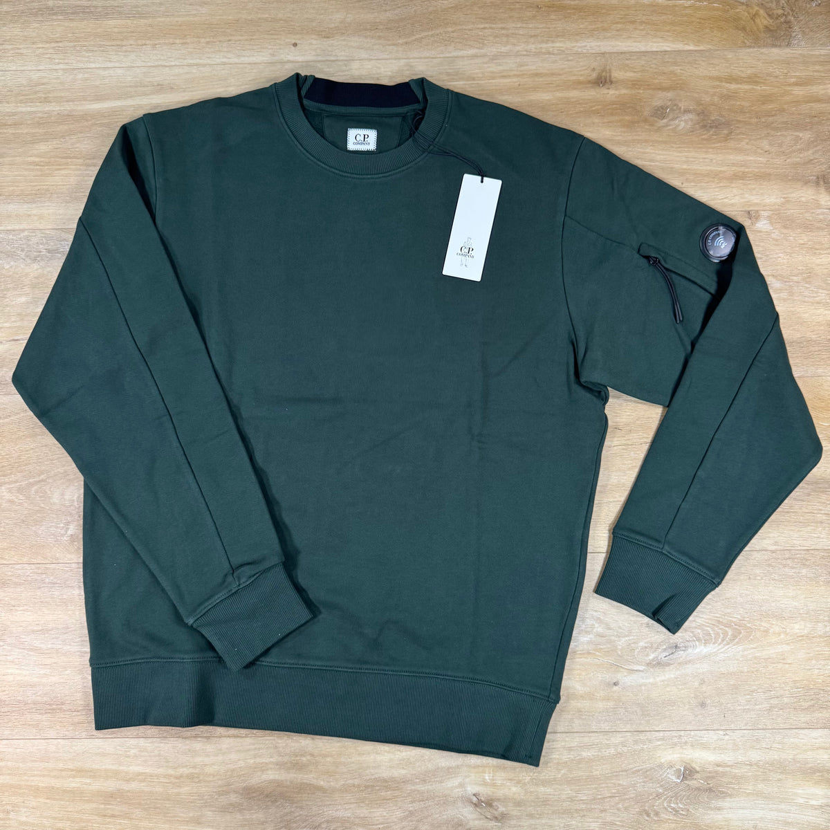 C.P. Company Diagonal Raised Fleece Crewneck Lens Sweatshirt in Ponderosa Pine - Green