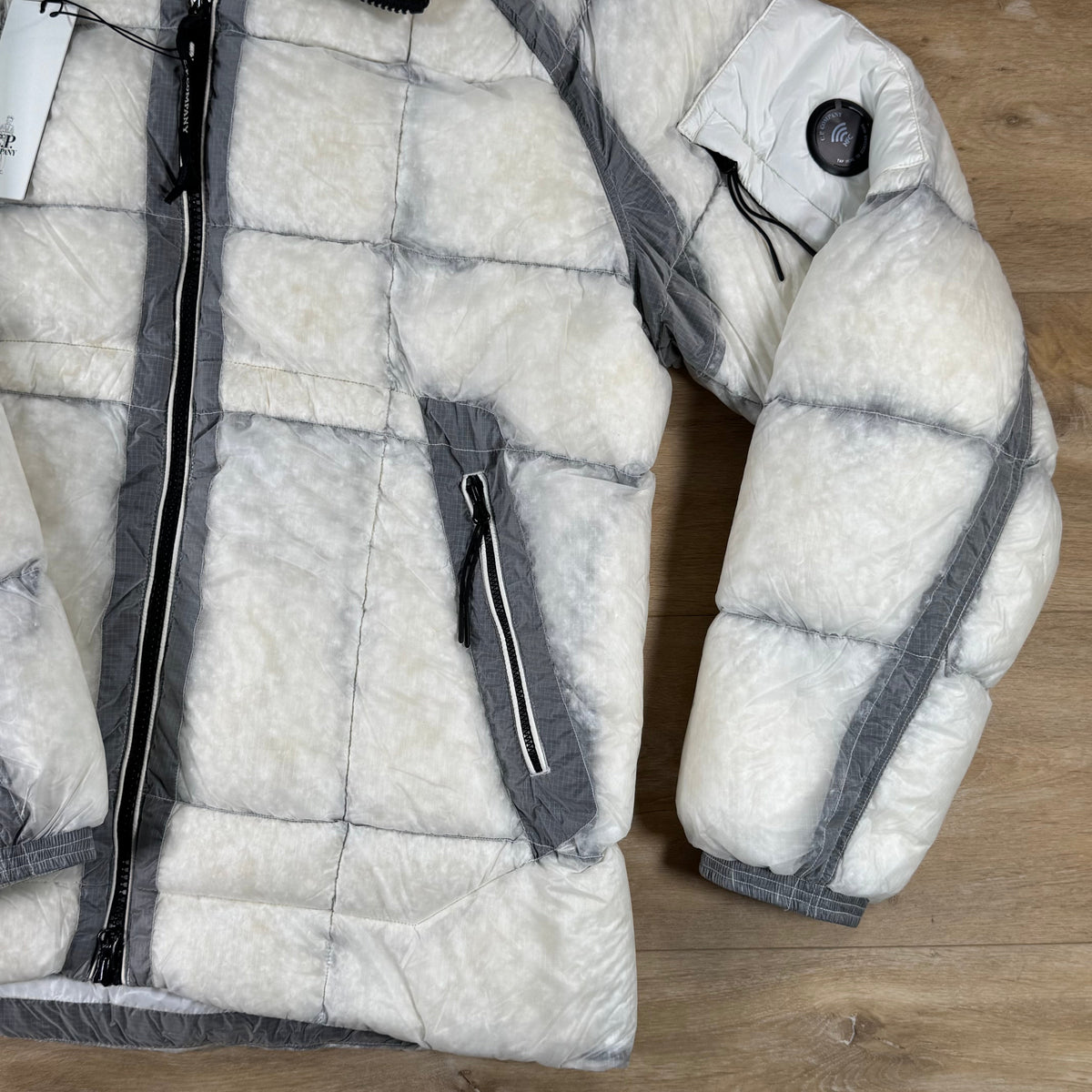 C.P. Company D.D. Shell Lens Puffer Jacket in Gauze White