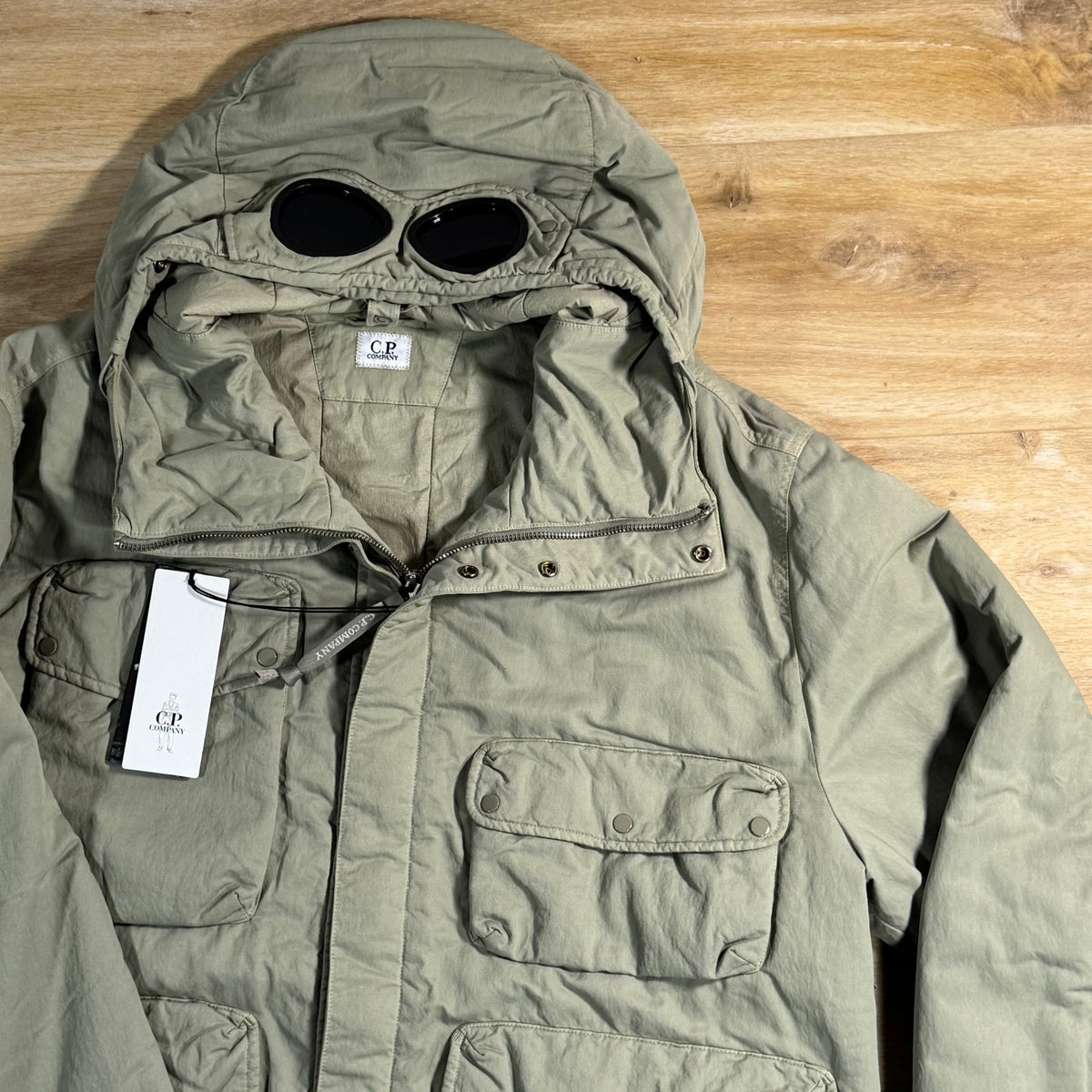C.P. Company T-Flatt Padded Goggle Jacket in Fallen Rock - Beige