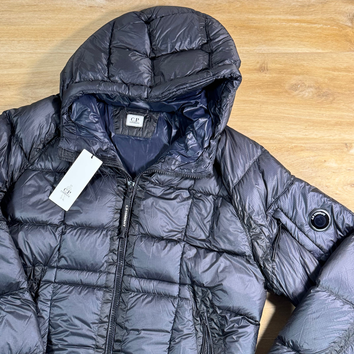 C.P. Company D.D. Shell Lens Puffer Jacket in Navy