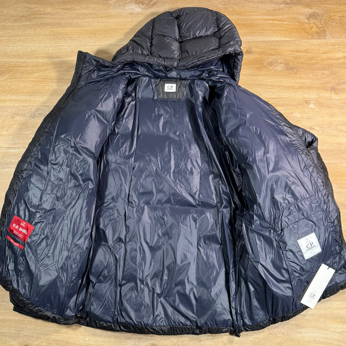 C.P. Company D.D. Shell Lens Puffer Jacket in Navy