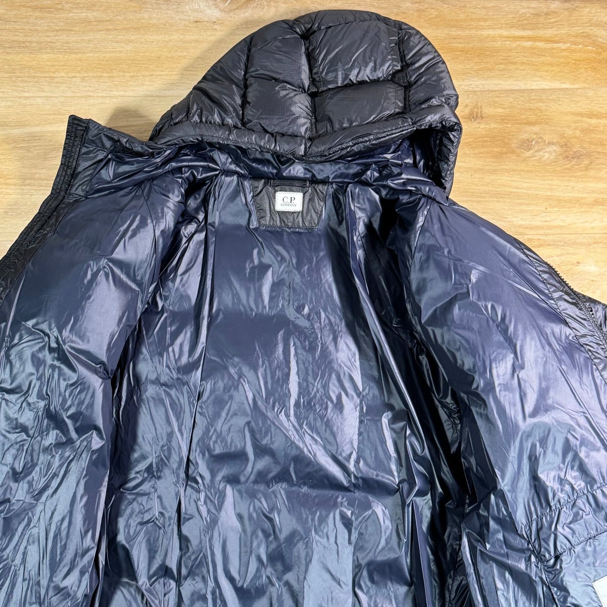 C.P. Company D.D. Shell Lens Puffer Jacket in Navy