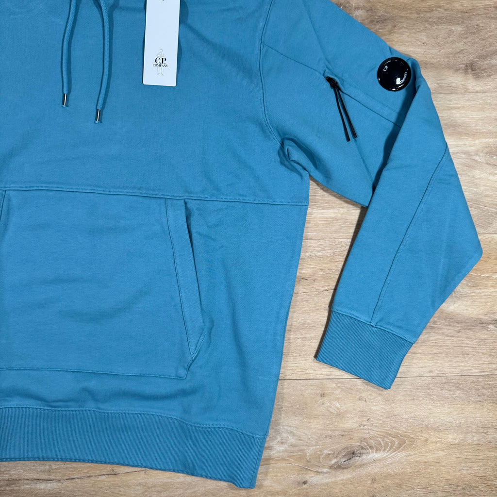 C.P. Company Diagonal Raised Fleece Lens Hoodie in Aegean Blue