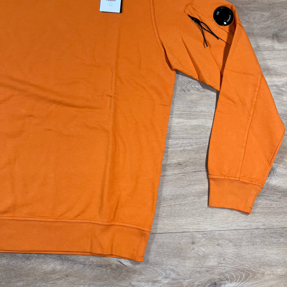 C.P. Company Light Fleece Crewneck Lens Sweatshirt in Russet Orange
