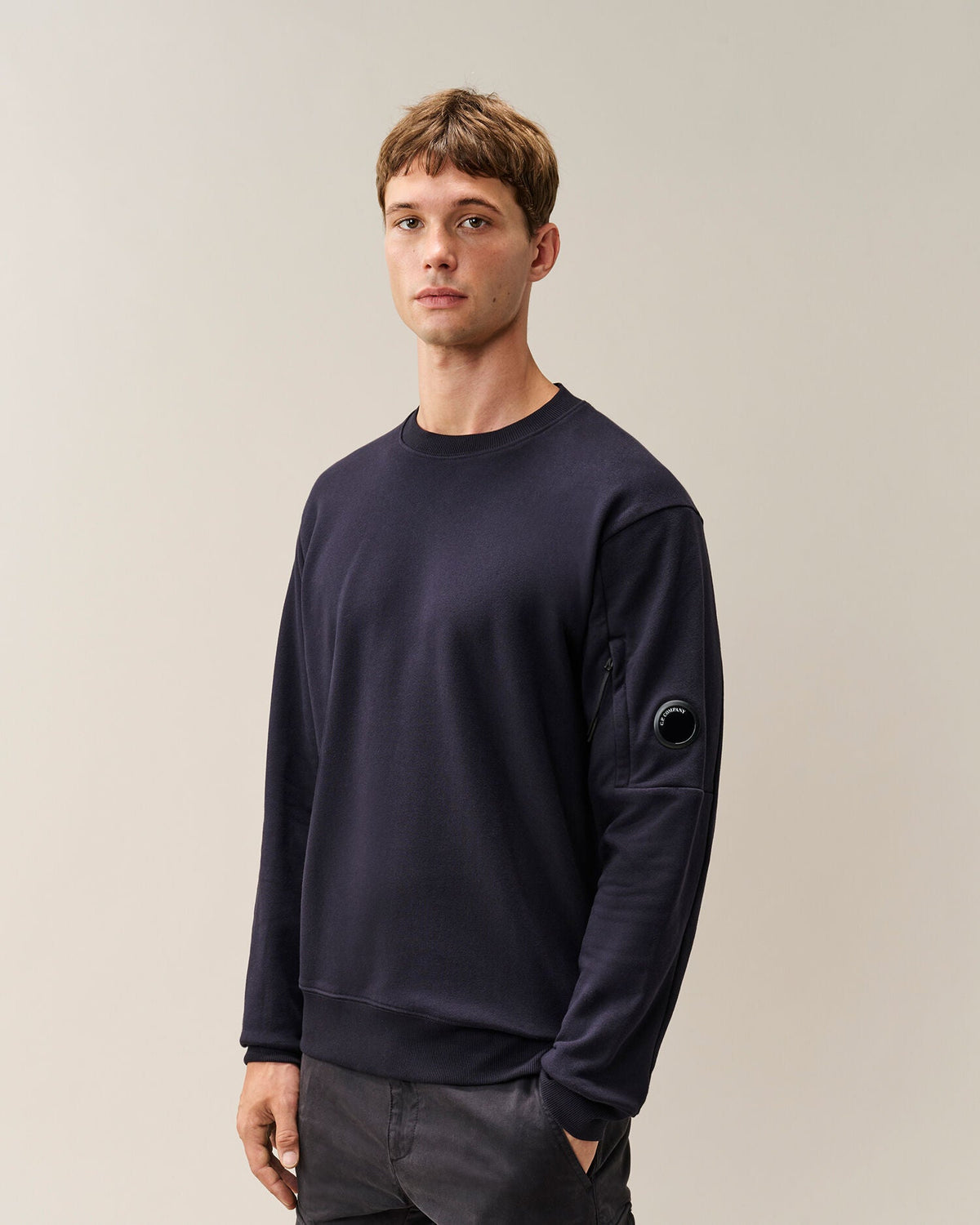 C.P. Company Diagonal Raised Fleece Crewneck Lens Sweatshirt in Navy