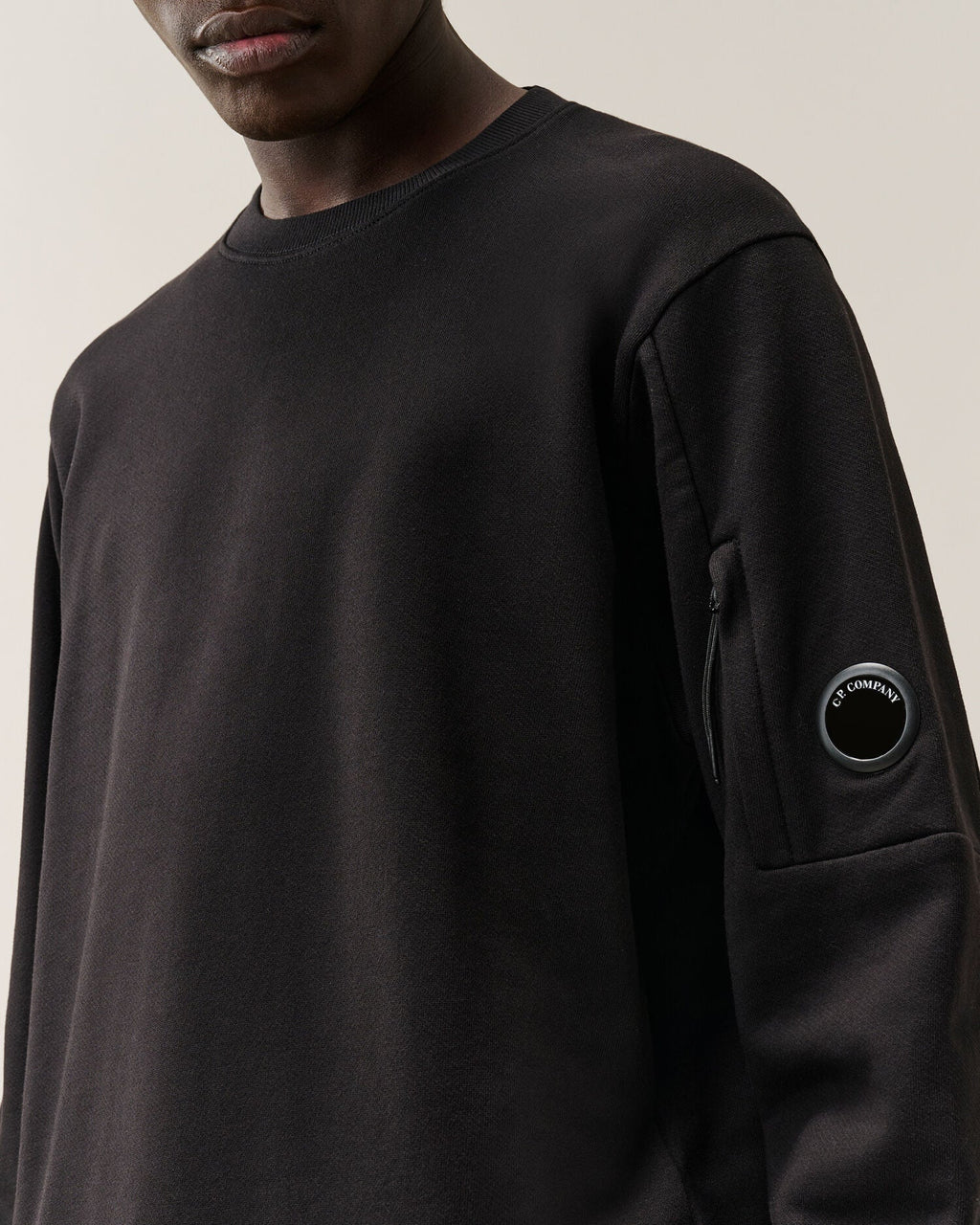 C.P. Company Diagonal Raised Fleece Crewneck Lens Sweatshirt in Black
