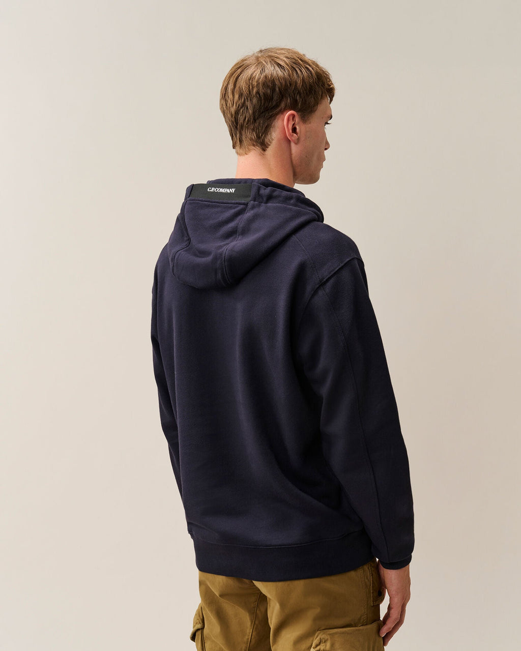 C.P. Company Diagonal Raised Fleece Lens Hoodie in Navy