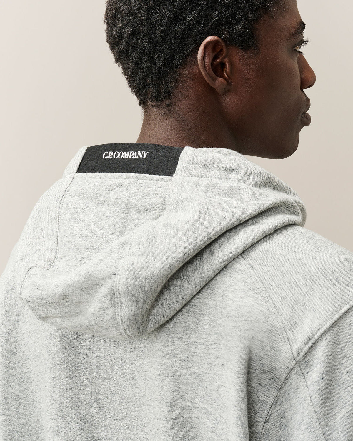C.P. Company Diagonal Raised Fleece Lens Hoodie in Grey Melange